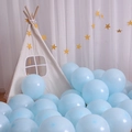 Pastel blue heart latex balloons displayed in a cozy white play tent for party decor - Macaron Round Balloons (50pcs) / Blue