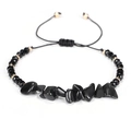 Handmade woven bracelet with black irregular stones, gold accents, and adjustable cord - Black