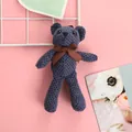Handmade navy blue crochet teddy bear plush pendant with brown ribbon and knit texture - Dark Blue