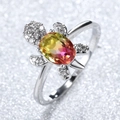 Silver turtle ring featuring a vibrant colorful gradient gemstone and white zircon accents - Pink-Yellow Gradient Zirconia