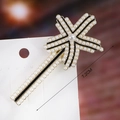 Detail view of 7.2cm geometric pearl hair clip with crystal accents on a display card - S192-9 Pearl Star Cross Hair Clip