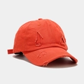 Detailed view of the distressed orange cotton baseball cap with vintage worn-out effects - Orange