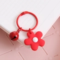 Chic red flower keychain with matching bell accessory for handbags and fashion items - Red Flower With Bell