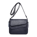 Navy blue crossbody bag in pebbled leather with adjustable strap and side zipper tassel - Blue