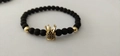 Men's 6mm black matte stone bead bracelet with a gold crown charm and crystals - Crown Style / Gold