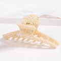 Detail of cream marble acetate hair claw clip showing a strong gold metal spring - S138-3 Beige Cloud Marble