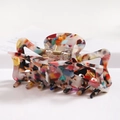 Detailed macro view of acetate hair claw clip with floral pattern and golden spring - S141-12 Colorful Floral