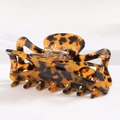 Detail of tortoise shell hair claw clip with golden metal spring on white background - S141-6 Retro Tortoiseshell