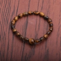Irregular tiger eye stone beaded bracelet for men on a dark wood background - Medium Size Specification / 6*9mm Tiger Eye + 10mm Round Bead