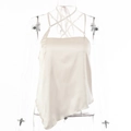 Detailed view of cream satin halter top featuring irregular hem and silk texture on mannequin - S / Khaki
