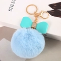 Light blue faux fur pompom keychain with a mint green leather bow and gold lobster clasp - Sky Blue - Litchi Bow