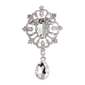 Vintage silver brooch featuring large oval crystal and teardrop rhinestone pendant - White