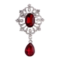 Elegant silver brooch featuring large red oval gem and hanging teardrop crystal with rhinestones - Red