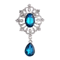 Elegant silver brooch featuring large oval and teardrop blue rhinestones on white base - Peacock Blue