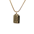 Close-up of golden rectangular letter B pendant with elegant box chain necklace - Letter B
