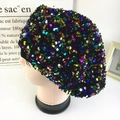Close-up of high-density colorful sequins on a velvet beret for women winter style - Rose Multi