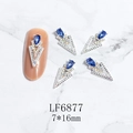 Detail of 7x16mm silver V-shaped nail art charm with blue teardrop stone and small crystals - Silver Blue Gem Style (6877)