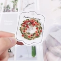 Christmas wreath brooch with red bow and rhinestones on festive backing card - Wreath with Red Bow
