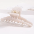Macro detail of cream acetate hair claw with marble texture on minimalist surface - S138-1 Cream Floral