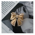 Elegant gold bow brooch with pearl edge on art magazine background, vintage style accessory - X030 Gold Bow with Pearl (No Pin Accessory)