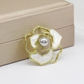 Elegant gold flower brooch with white petals and a grey pearl in luxury gift box - Camellia with Grey Pearl