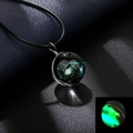 Luminous cosmic galaxy glass ball pendant necklace showing glowing green light effect - Luminous Style 11
