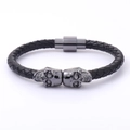 Pulsera punk de cuero trenzado para hombre con calaveras dobles de metal y cierre magnético - Doble Calavera / Color gunmetal