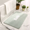 Light green rectangular plush bath mat with Bath embroidery on marble floor - 40x60cm / Mint Green