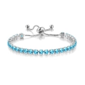 Detail shot of silver adjustable tennis bracelet with round blue cubic zirconia stones - Silver - Sea Blue
