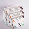 Three-piece set of white paper gift bags with tropical palm leaves and rivet handles - Fashion Tropical Leaves Rivet Style