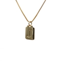 Polished gold copper pendant necklace featuring an engraved letter J on a white background - Letter J