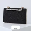 Sparkling black glitter evening clutch bag with crystal-encrusted rectangular handle - Black