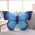 Detailed close-up of a large blue and black butterfly plush pillow case on a chair - 40*30cm (With Filling) / Blue