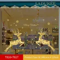 Golden Christmas window decals with running reindeer, snowflakes and Merry Christmas text - T816+T817 Set
