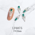 Macro detail of 7x16mm silver hollow triangle nail charm with green teardrop crystal - Silver Green Gem Style (6875)