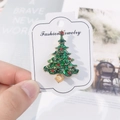 Christmas tree brooch with green enamel and sparkling rhinestones on golden finish - Green Christmas Tree