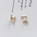 Close-up of geometric H-shaped gold earrings with inlaid pearls and zircon stones - 62# Geometric H-Shape