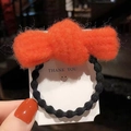 Elastico per capelli nero con un grande fiocco di peluche arancione morbido - Linea di Punti Fiocco-Arancione