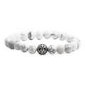 White turquoise beaded bracelet with stainless steel cross charm on white background - Howlite