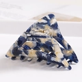 Macro detail of large triangular hair claw clip with blue and white marble pattern - S140-9 Triangle Blue White Mix