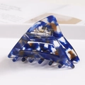 Detailed macro view of dark blue marble acetate hair claw with strong metal spring - S140-10 Triangle Deep Blue Marble