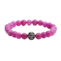 Macro shot of pink stone beaded bracelet featuring a vintage silver hollow cross bead - Rose Red