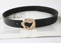 Detailed view of black leather belt featuring an intricate gold snake-shaped metal buckle - Black