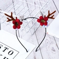 Christmas headband with brown antlers, red flowers, and pinecones on white wood background - Blue Red Flowers with White Pinecone / 29#