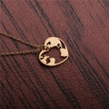 Collana in acciaio al titanio dorato con ciondolo a cuore traforato e mappa del mondo - Oro