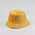Detail of orange paisley bucket hat with white bandana print on a white background - M (56-58cm) / Yellow