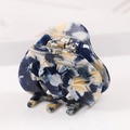 Detail of large acetate hair claw clip with blue and yellow marble pattern and metal spring - S136-9 Bow Deep Blue Marble