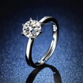 Classic silver adjustable ring with a six-prong round moissanite on a dark background - Y089【1 Carat】