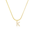 Detailed shot of golden snake chain necklace with a crystal-studded letter K pendant - Letter K