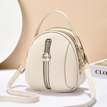 White mini round backpack in lychee texture leather with rose pendant and golden zippers - Off-white
